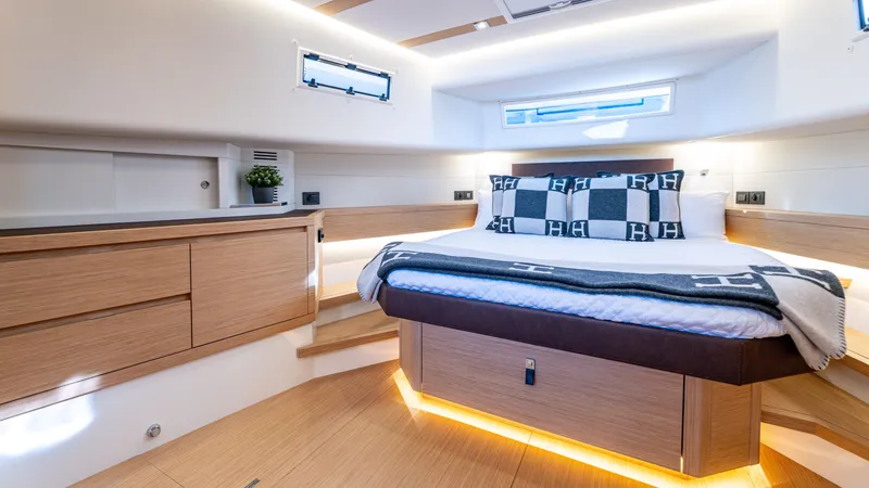 Slide: The Image of Luxurious cabin interior of 2022 Pardo Yachts 50, featuring modern design and cozy bedding. - 41