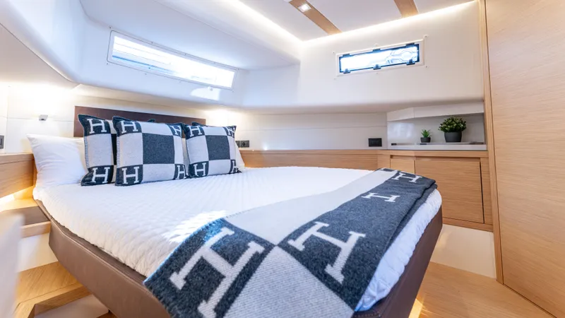 Slide: The Image of Luxurious cabin interior of 2022 Pardo Yachts 50 with modern design and cozy bedding. - 42