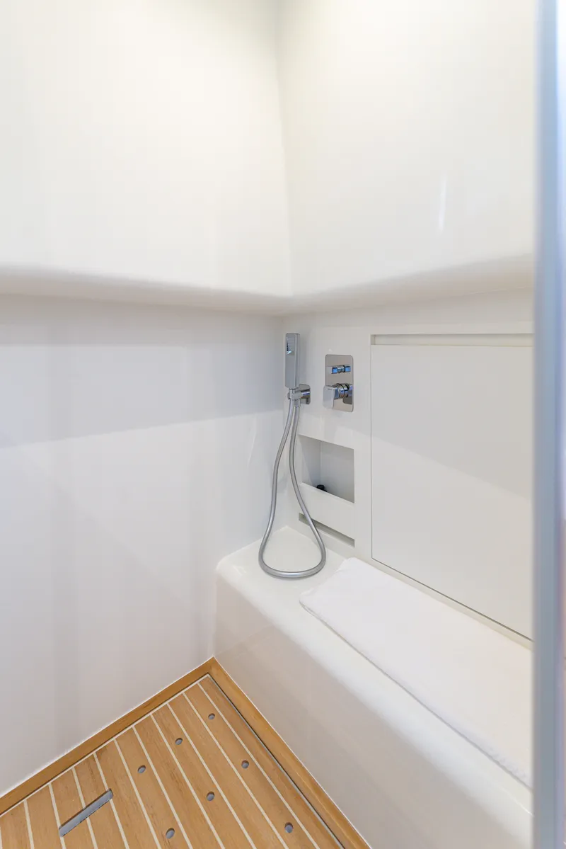 Slide: The Image of Modern shower area in 2022 Pardo Yachts 50 with sleek design and wooden flooring. - 49
