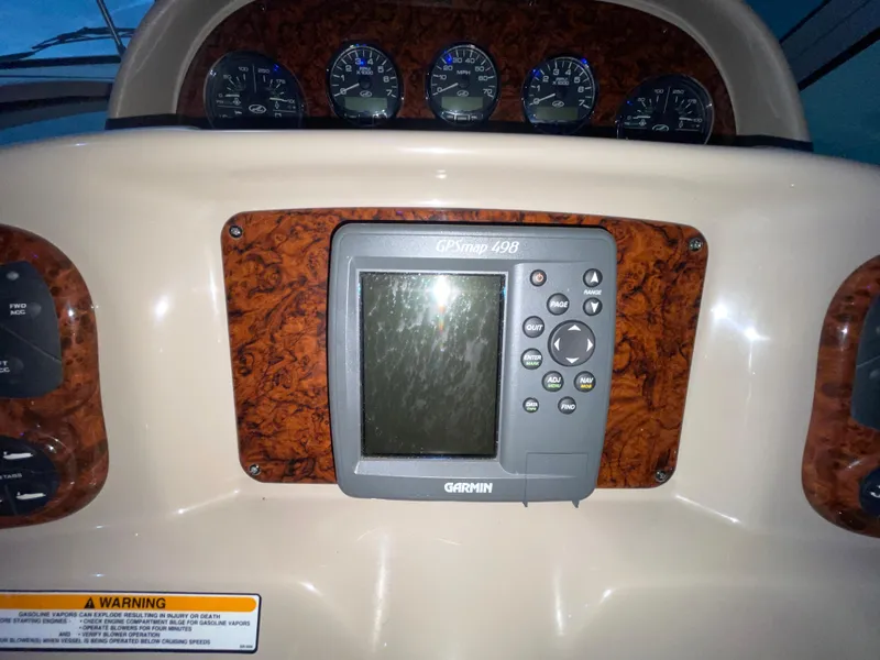 Slide: The Image of Dashboard of 2005 Sea Ray 300 Sundancer with Garmin GPS and gauges. - 19
