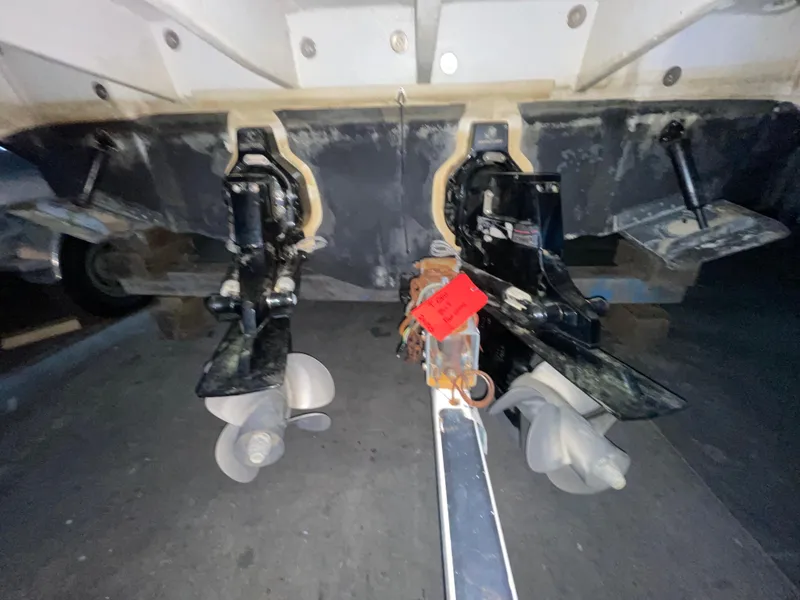 Slide: The Image of 2005 Sea Ray 300 Sundancer boat stern with dual propellers and outdrives. - 3