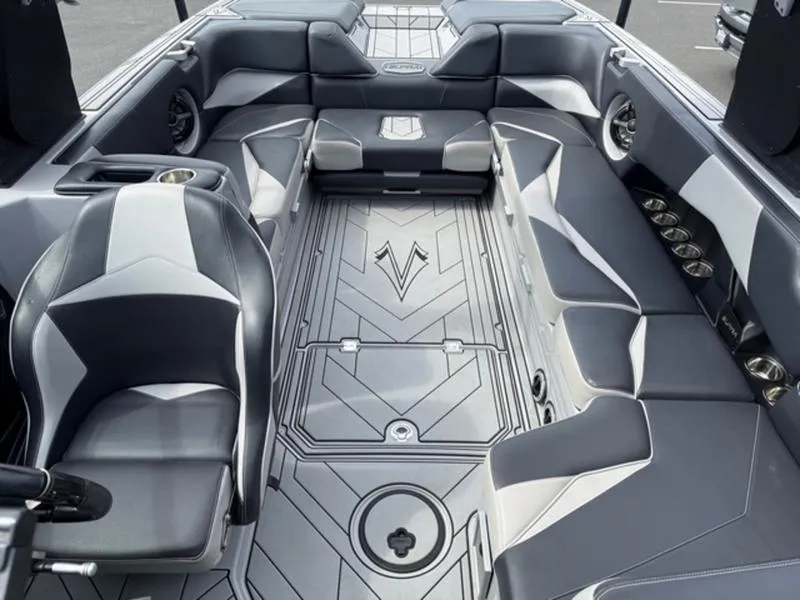 Slide: The Image of 2020 Supra SL450 boat interior with sleek gray seating and modern design. - 14