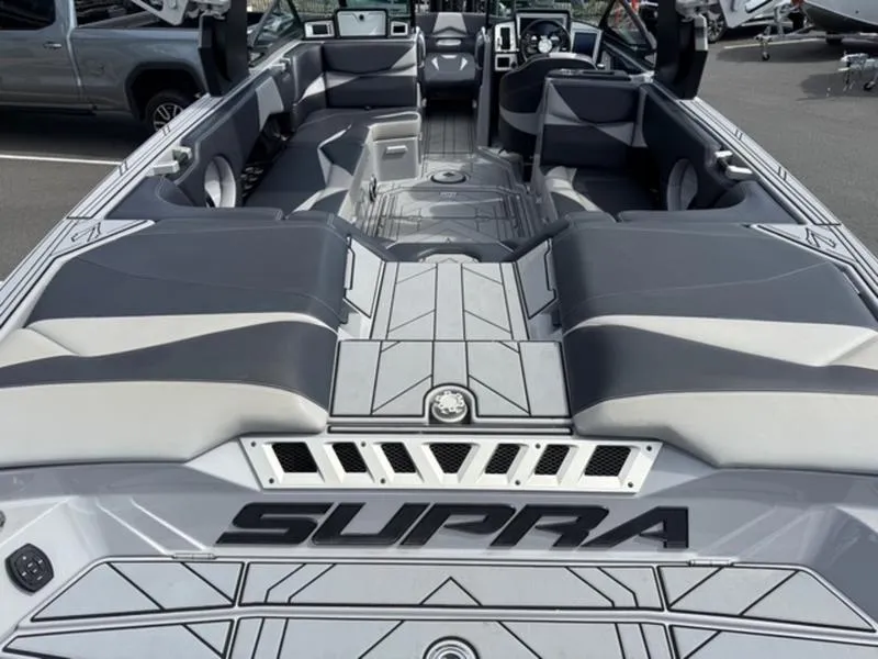 Slide: The Image of 2020 Supra SL450 boat interior with modern seating and sleek design. - 6