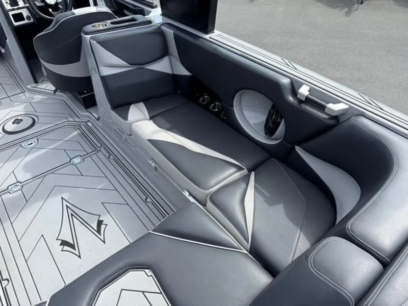 Slide: The Image of 2020 Supra SL450 interior with sleek gray seating and modern design elements. - 8