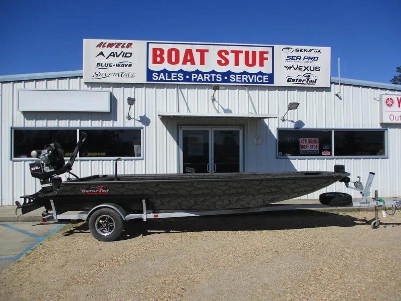 Slide: The Image of 2025 Gator Tail 1754 Extreme boat outside Boat Stuf sales and service shop. - 0