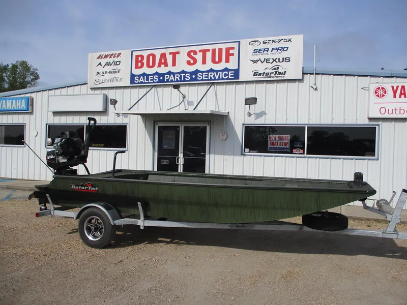 Slide: The Image of 2025 Gator Tail 1754 Extreme boat on trailer outside Boat Stuf store. - 1