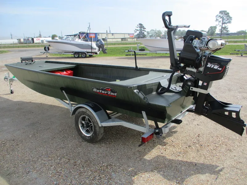 Slide: The Image of 2025 Gator Tail 1754 Extreme boat on trailer, featuring a powerful outboard motor. - 4