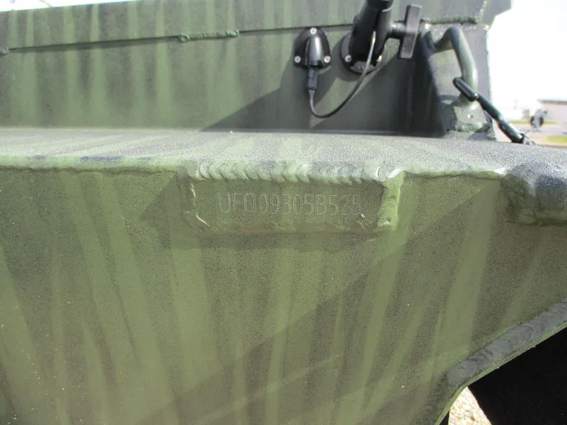 Slide: The Image of 2025 Gator Tail 1754 Extreme boat, close-up of hull with camouflage pattern. - 8