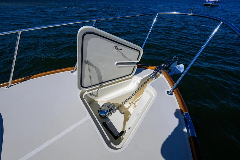 Slide: The Image of Hinckley Picnic Boat 37 MKIII 2010 anchor hatch open on deck, ocean background. - 26