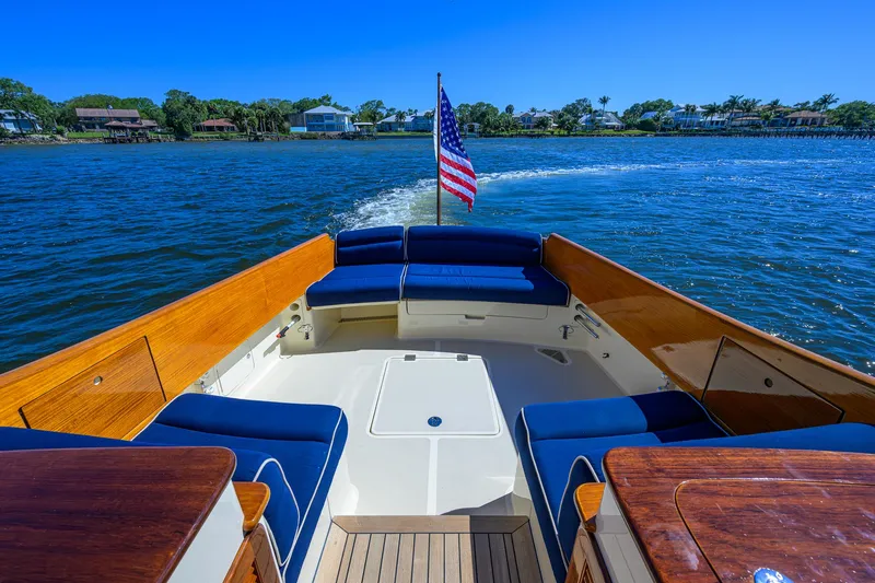 Slide: The Image of Hinckley Picnic Boat 37 MKIII, 2010, cruising on a sunny day with American flag. - 5