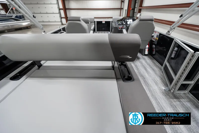 Slide: The Image of 2025 Bennington 21 SSB pontoon boat interior with gray seating and modern design. - 16