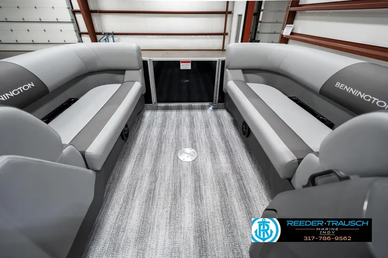 Slide: The Image of 2025 Bennington 21 SSB pontoon boat interior with gray seating and carpeted floor. - 18
