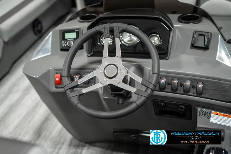 Slide: The Image of Steering console of 2025 Bennington 21 SSB boat with modern controls and dashboard. - 29