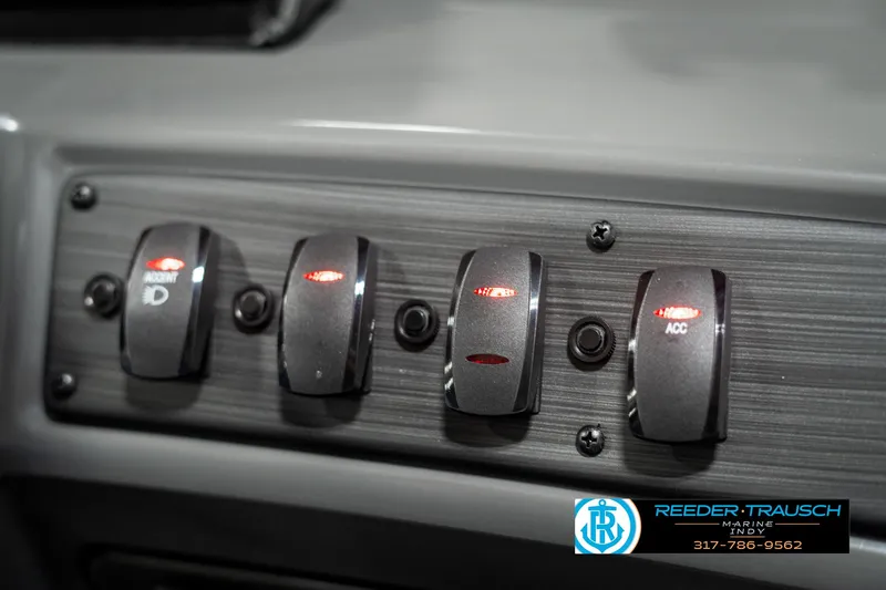 Slide: The Image of Control panel of 2025 Bennington 21 SSB boat with labeled switches. - 35