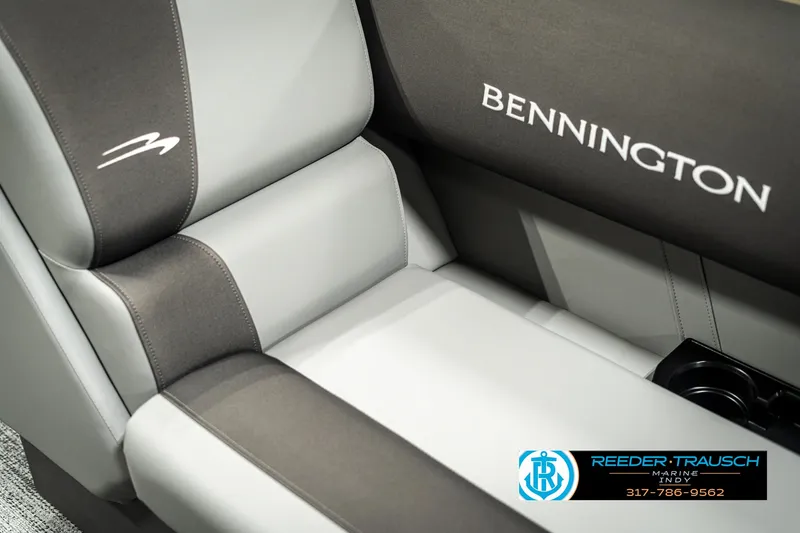 Slide: The Image of 2025 Bennington 21 SSB boat seat with logo, featuring gray and black upholstery. - 39