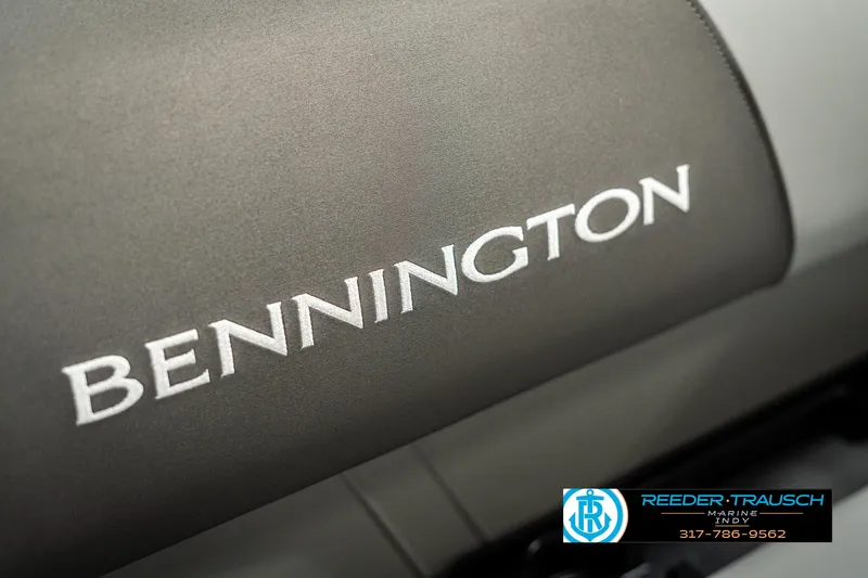 Slide: The Image of 2025 Bennington 21 SSB boat seat with logo, Reeder-Trausch Marine contact details. - 44