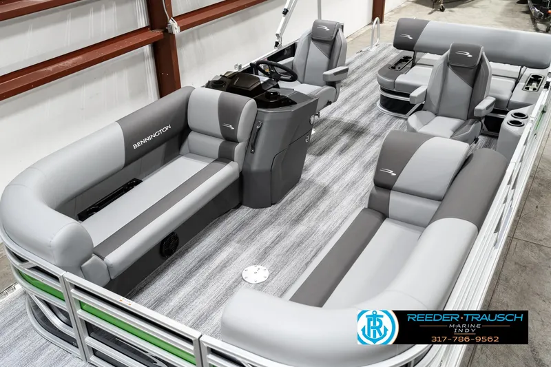Slide: The Image of 2025 Bennington 21 SSB pontoon boat with gray seating and modern interior design. - 9