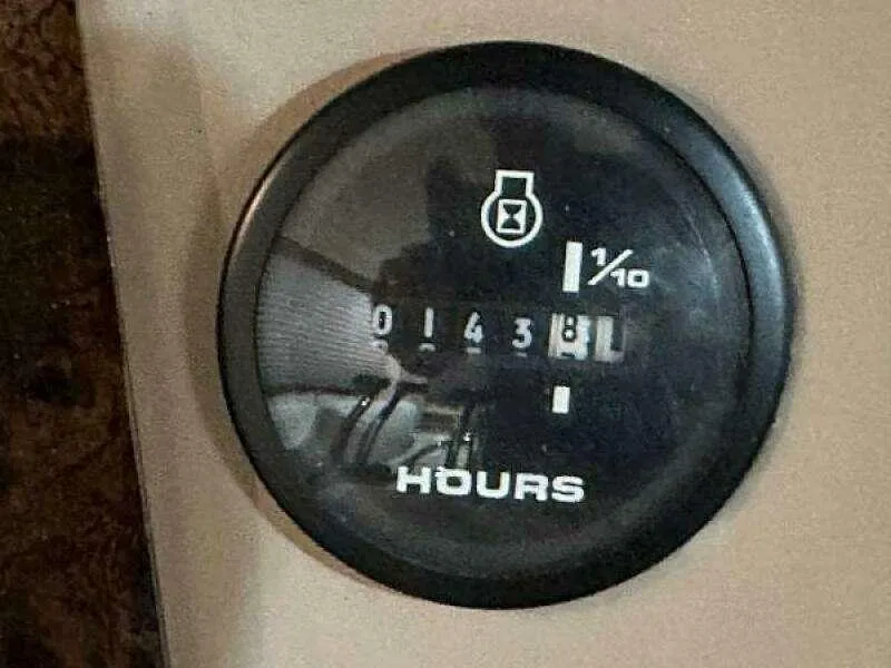 Slide: The Image of Hour meter showing 1438 hours on a 2004 Gibson 50 Houseboat. - 21