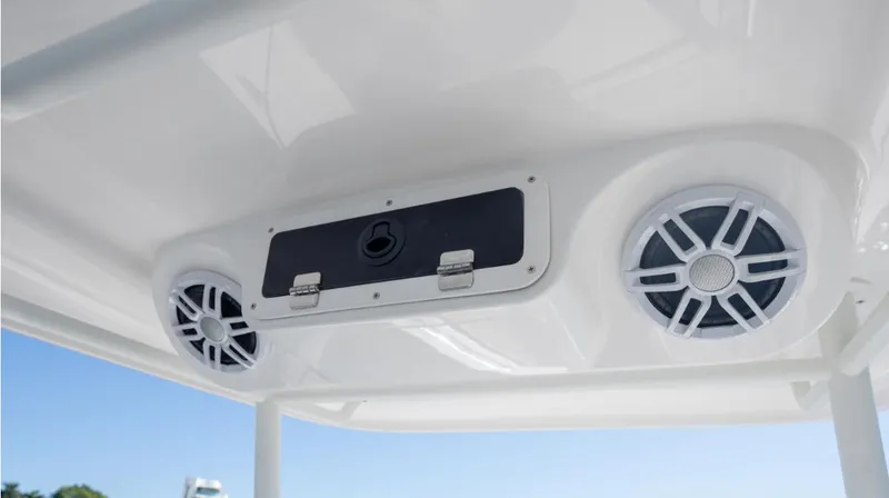 Slide: The Image of 2024 SeaWell 240CC boat speakers and storage compartment on white ceiling. - 31