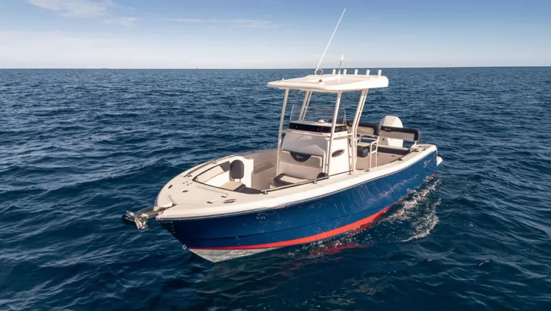 Slide: The Image of 2024 SeaWell 240CC boat on open water, featuring sleek design and modern amenities. - 35