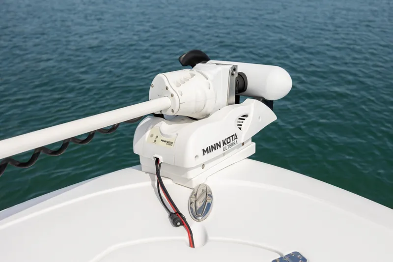 Slide: The Image of Minn Kota trolling motor on 2021 Sportsman Heritage 231 Center Console boat. - 25