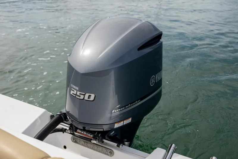 Slide: The Image of 2021 Sportsman Heritage 231 Center Console with Yamaha 250 outboard motor on water. - 29