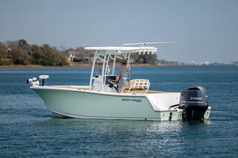 Slide: The Image of 2021 Sportsman Heritage 231 Center Console boat on calm water. - 3