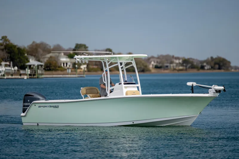 Slide: The Image of 2021 Sportsman Heritage 231 Center Console boat on calm water. - 5