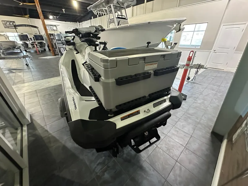 Slide: The Image of 2022 Sea-Doo Fish Pro Scout in showroom, rear view with storage box. - 3