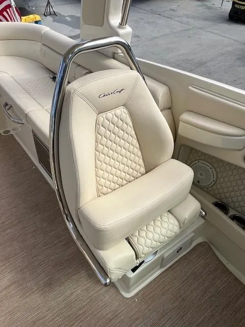 Slide: The Image of Luxurious interior of 2022 Chris-Craft Launch 28 GT with elegant cream seating. - 11