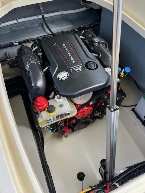 Slide: The Image of 2022 Chris-Craft Launch 28 GT engine compartment showcasing powerful motor and components. - 21