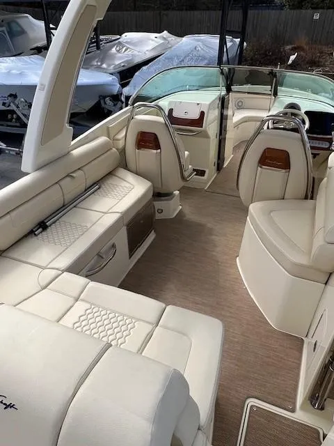 Slide: The Image of 2022 Chris-Craft Launch 28 GT interior with luxurious seating and elegant design. - 9