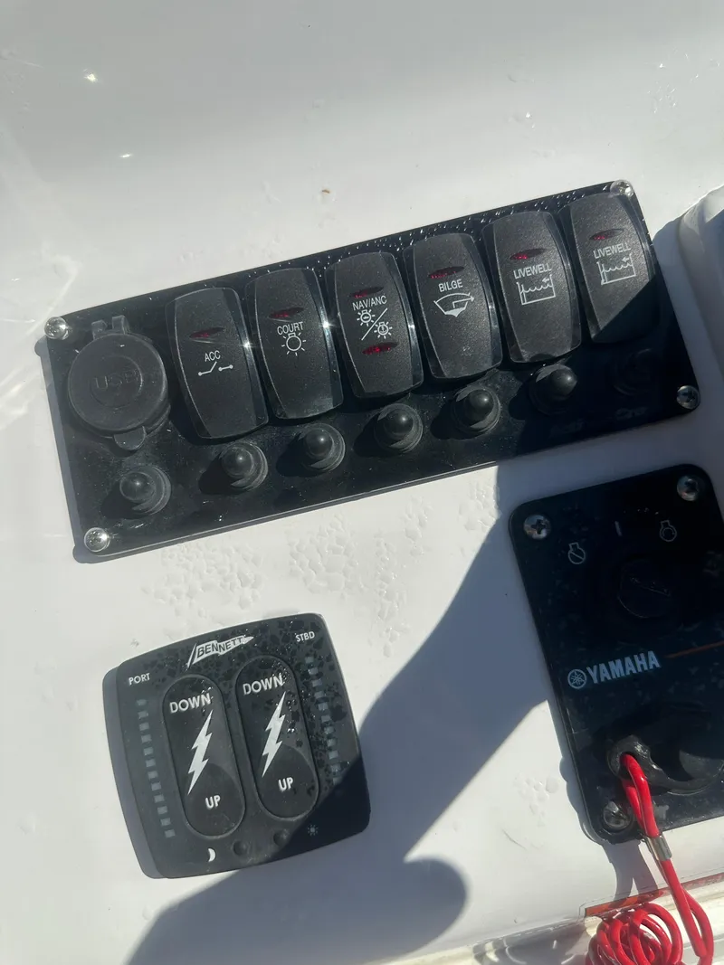 Slide: The Image of Control panel of 2025 Action Craft 17 Flats Flyfisher boat with Yamaha components. - 25