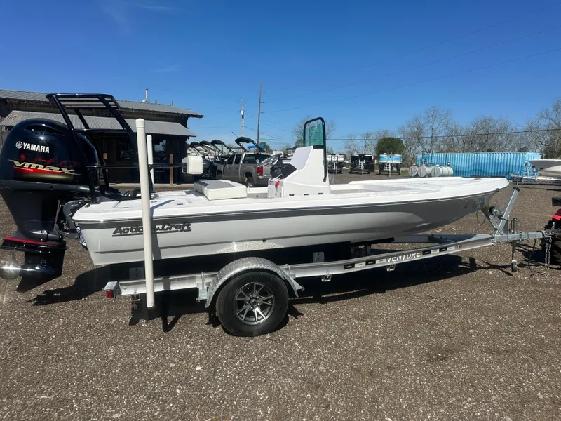 Slide: The Image of 2025 Action Craft 17 Flats Flyfisher boat on trailer with Yamaha outboard motor. - 3