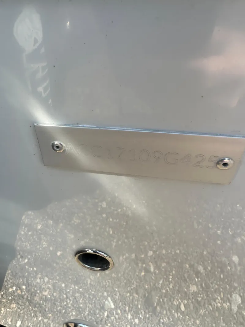 Slide: The Image of Close-up of Action Craft 17 Flats Flyfisher 2025 boat identification plate. - 6