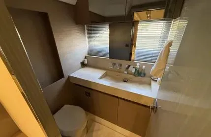 Slide: The Image of Luxurious bathroom in 2018 Prestige 680 yacht with modern fixtures and elegant design. - 17