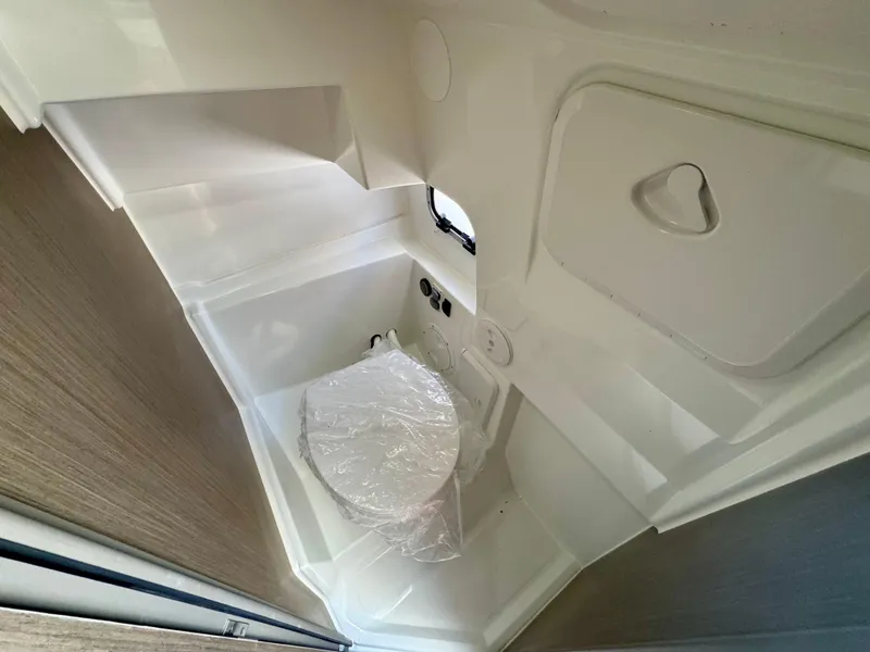 Slide: The Image of 2024 Beneteau Flyer 8 SUNdeck interior bathroom with compact design and modern fixtures. - 12