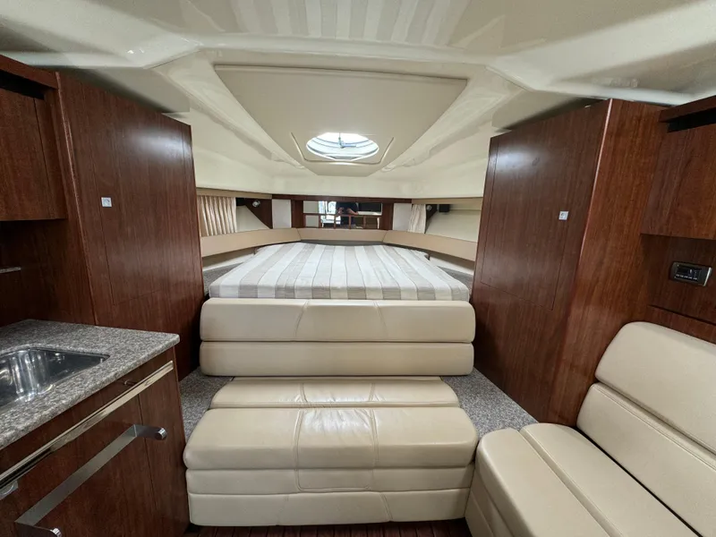 Slide: The Image of Interior of 2014 Monterey 340 Sport Yacht with luxurious seating and modern design. - 14