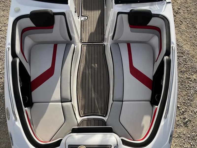 Slide: The Image of 2018 Yamaha Boats 242X E-Series interior with red and gray seating, top view. - 7