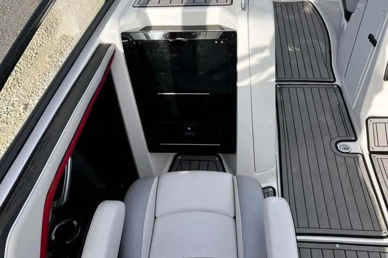 Slide: The Image of 2018 Yamaha Boats 242X E-Series interior with sleek seating and modern design. - 9