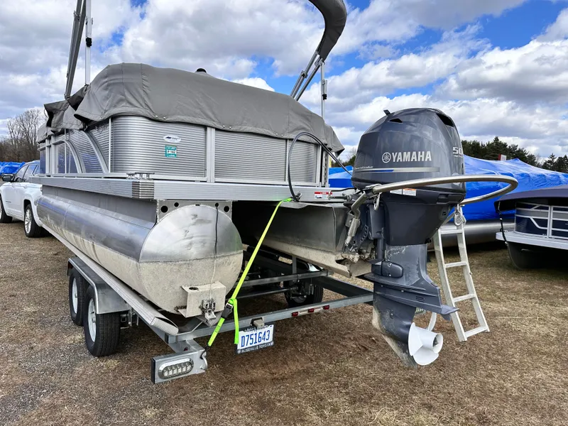Slide: The Image of 2019 Bennington 20 SLM Pontoon with Yamaha outboard motor on trailer. - 3