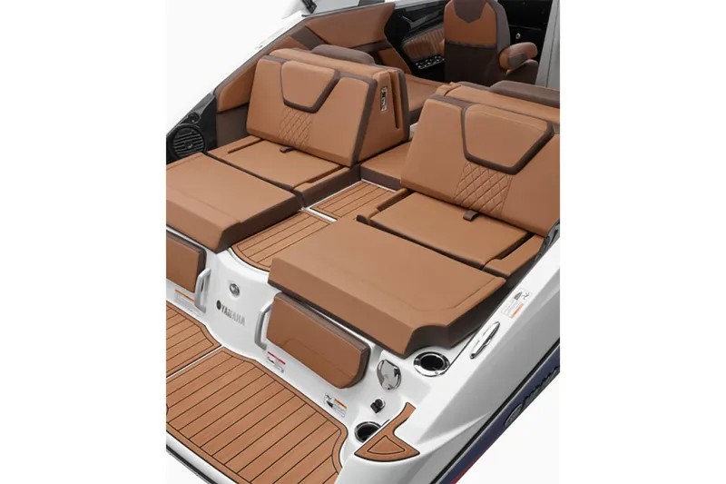 Slide: The Image of 2025 Yamaha Boats 252SE interior with luxurious brown seating and sleek design. - 5