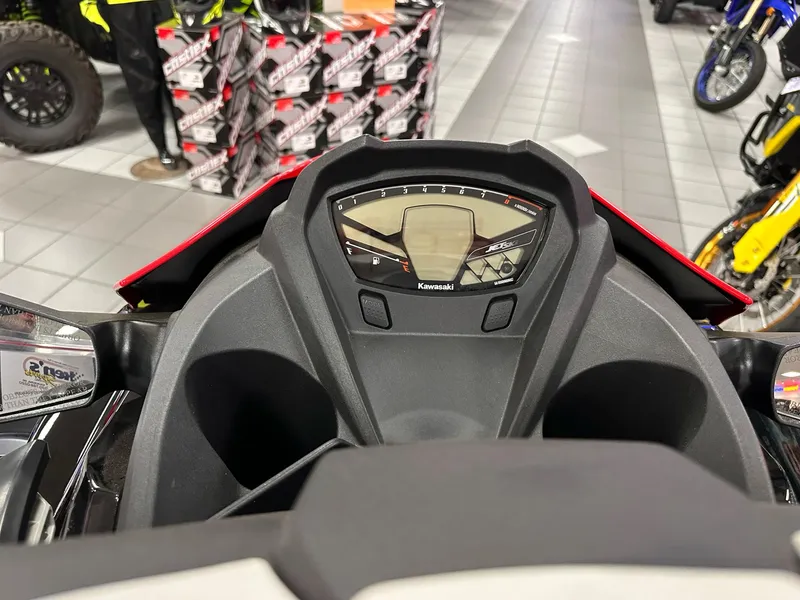 Slide: The Image of Dashboard view of a 2025 Kawasaki Jet Ski STX 160LX in a showroom setting. - 5