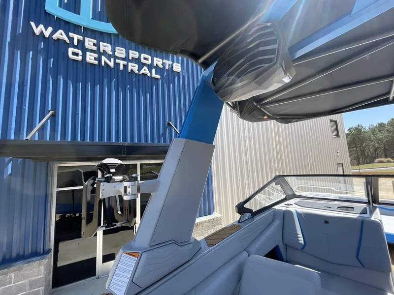 Slide: The Image of 2025 Nautique Super Air Nautique G25 at Watersports Central dealership. - 18