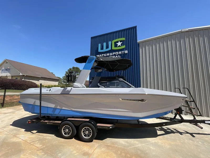 Slide: The Image of 2025 Nautique Super Air Nautique G25 boat on trailer at Watersports Central. - 2