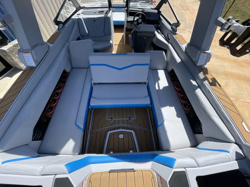 Slide: The Image of 2025 Nautique Super Air Nautique G25 interior with spacious seating and modern design. - 20