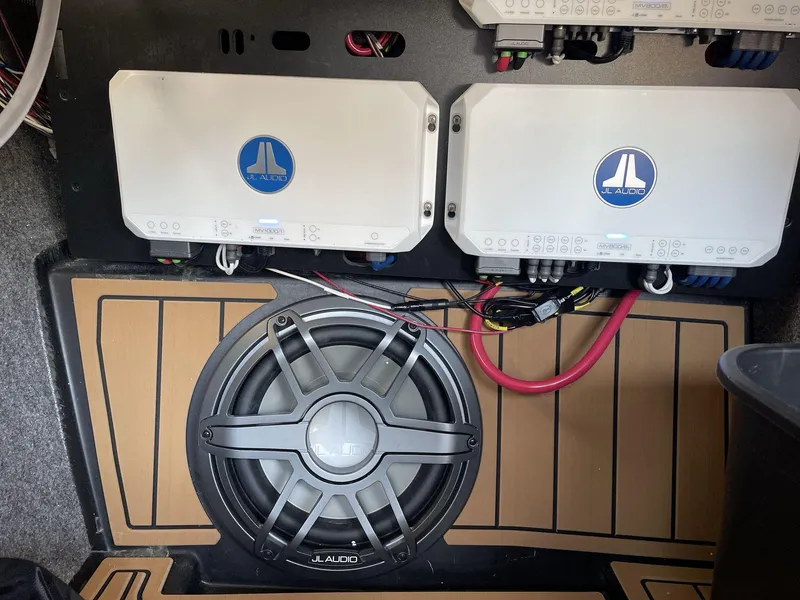 Slide: The Image of Audio system in 2025 Nautique Super Air Nautique G25 with JL Audio amplifiers and subwoofer. - 23