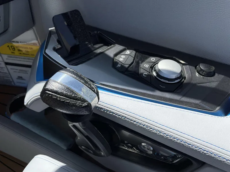 Slide: The Image of Control panel of 2025 Nautique Super Air Nautique G25 boat, featuring sleek design and modern controls. - 26