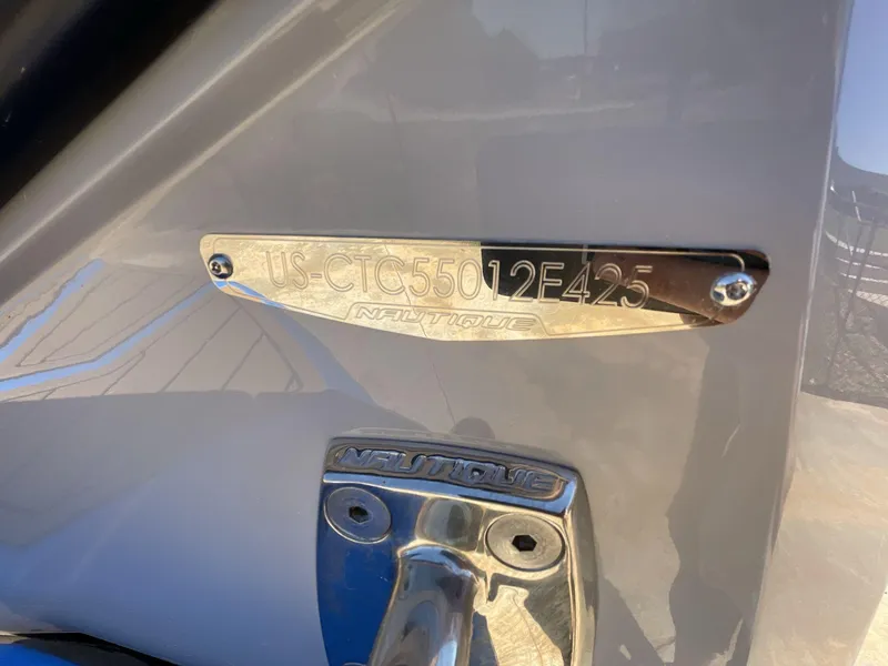 Slide: The Image of 2025 Nautique Super Air Nautique G25 hull identification plate and logo detail. - 3