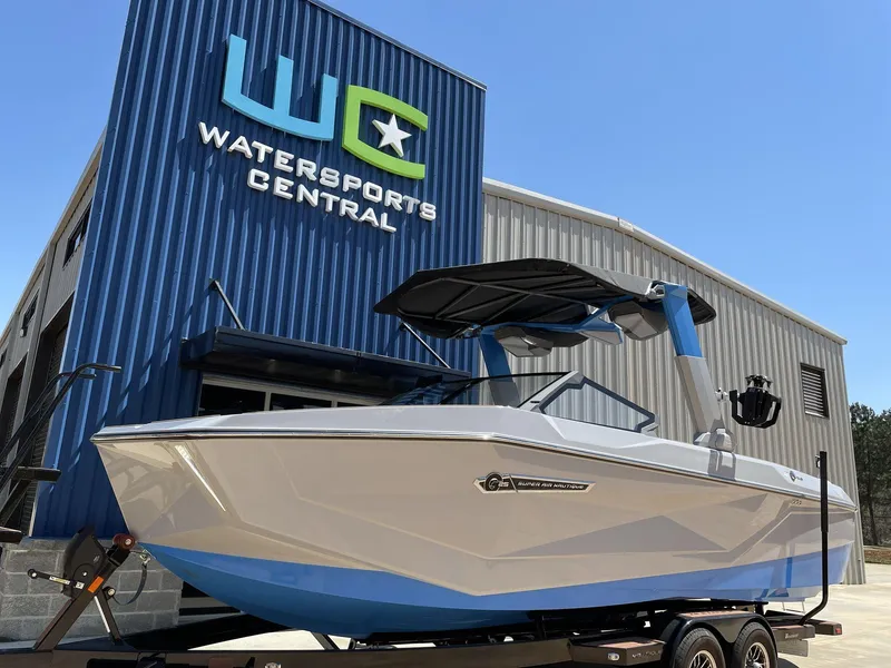 Slide: The Image of 2025 Nautique Super Air Nautique G25 boat at Watersports Central dealership. - 4